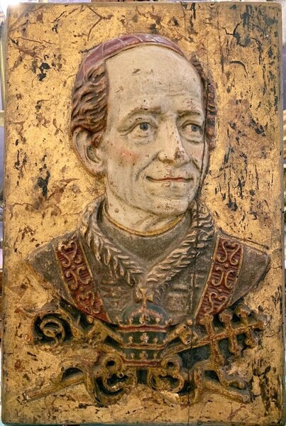 Bas relief in polychrome carved wood