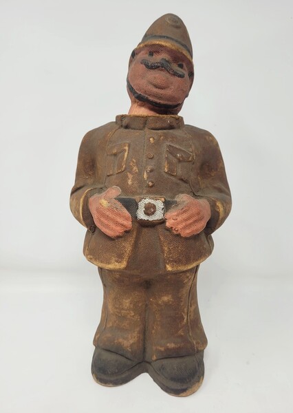 Bobby policeman with moving head (missing the counterweight) - felt cardboard - around 1950