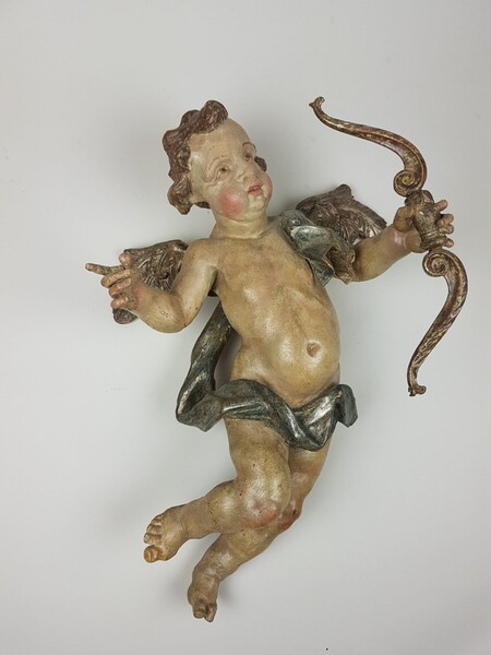 Cherub in carved and polychromed wood, Germany early 18th