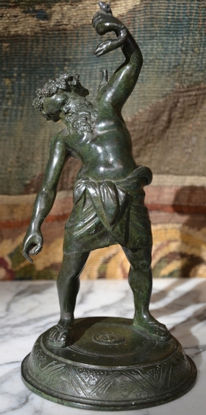 Green Patinated Bronze of a man fighting a snake, 19th.c