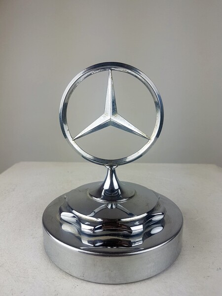 Mercedes mascot in chrome metal