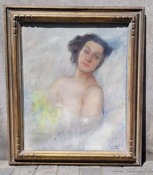 Oil on canvas representing the portrait of a young lady - signed JH Wolhoof