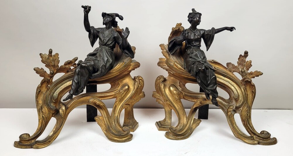 Pair of Chinese andirons in gilded bronze and dark patina