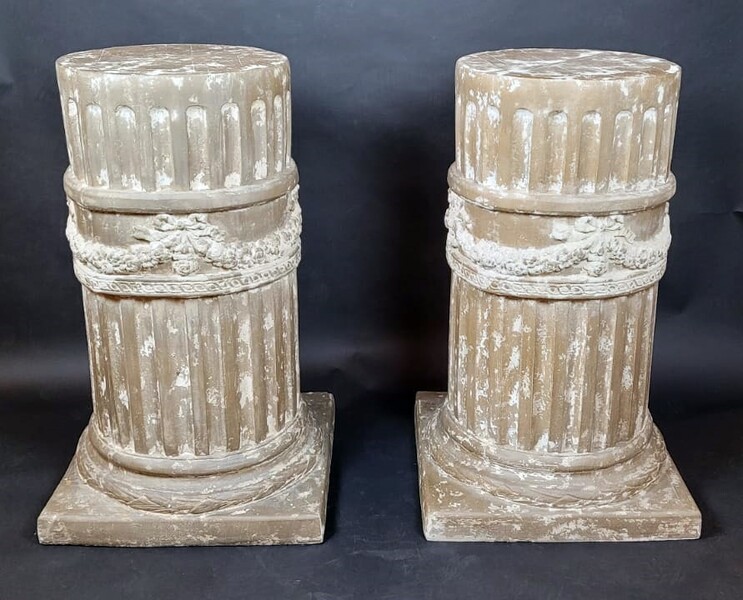 Pair of plastered fiber columns