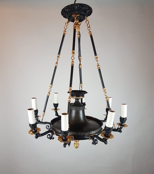 Small Restoration period chandelier in bronze with black and gold patina