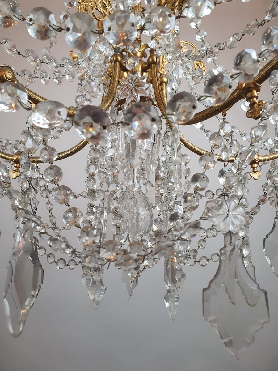 1900 chandelier with glass pendants