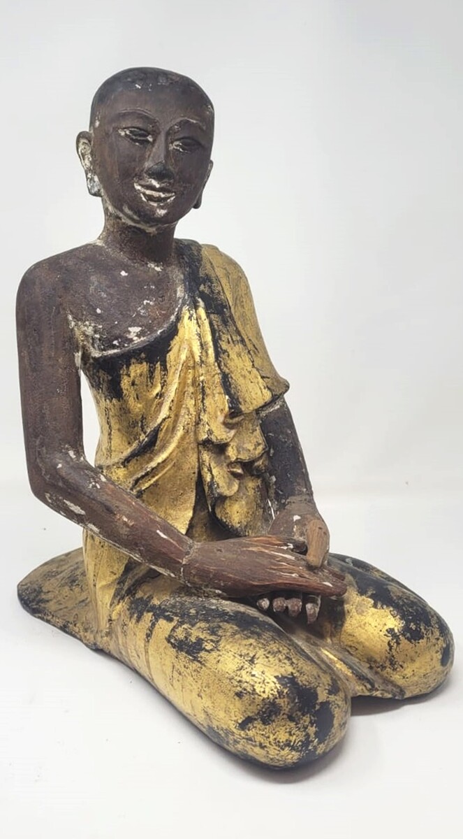 Buddhist monks in polychrome carved wood