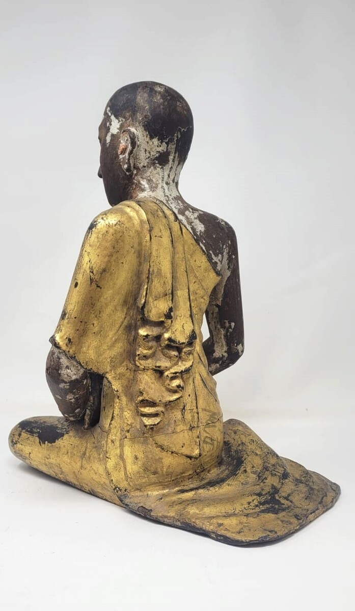 Buddhist monks in polychrome carved wood