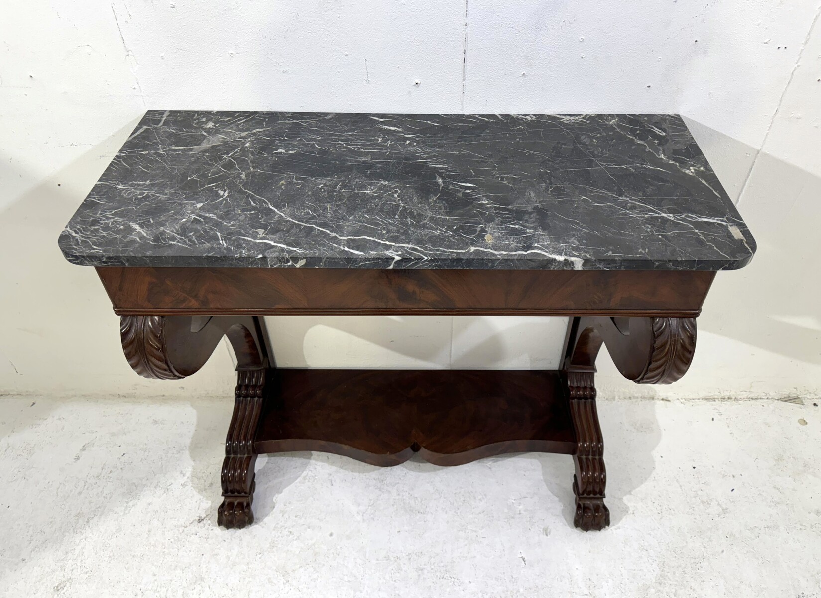 Charles X mahogany console with its marble