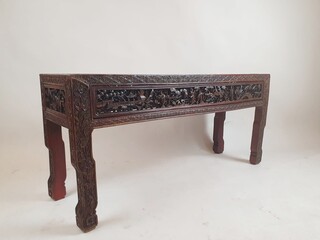 Chinese bench, red lacquered, finely carved with figures, early 20th century