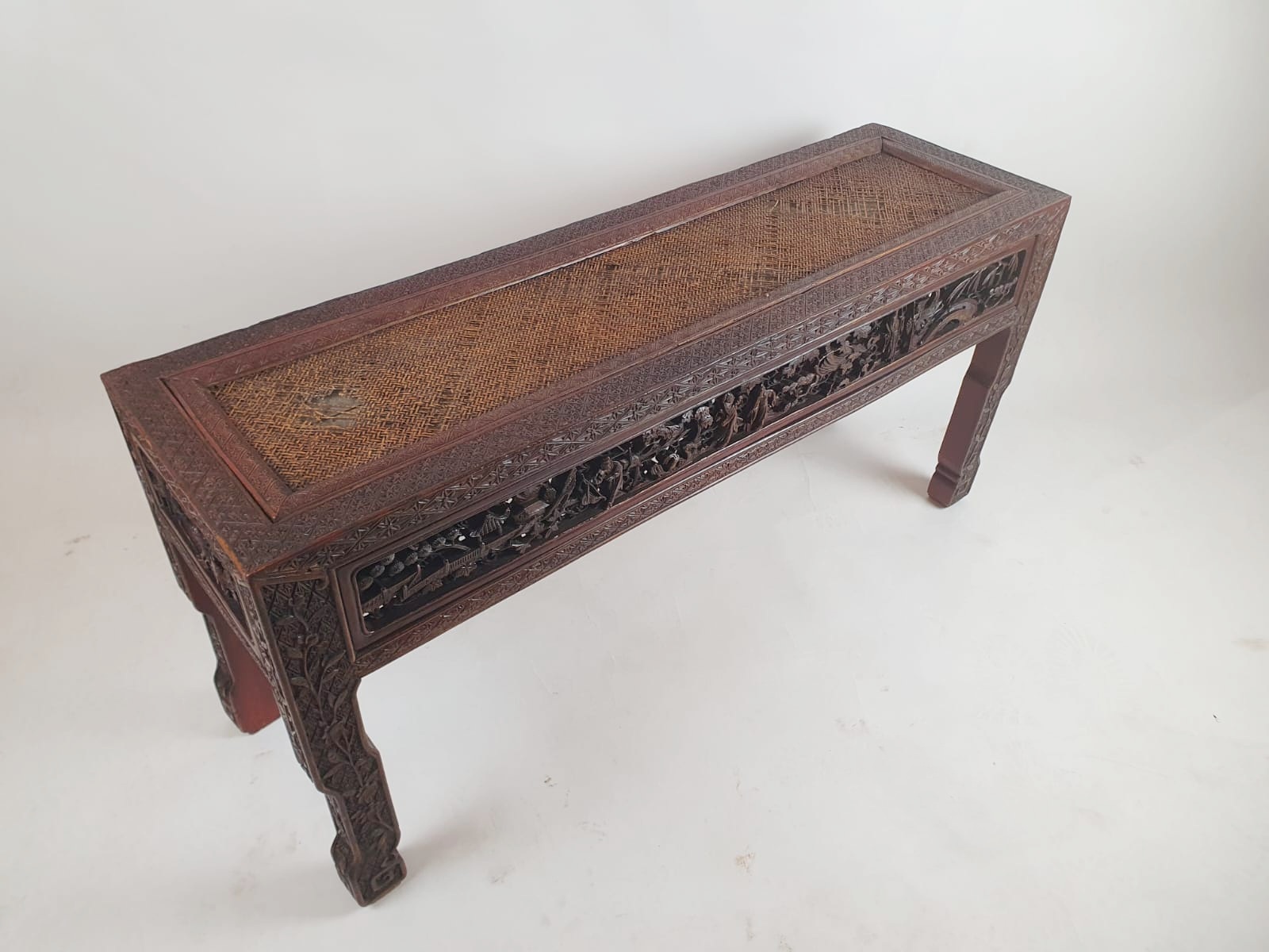 Chinese bench, red lacquered, finely carved with figures, early 20th century