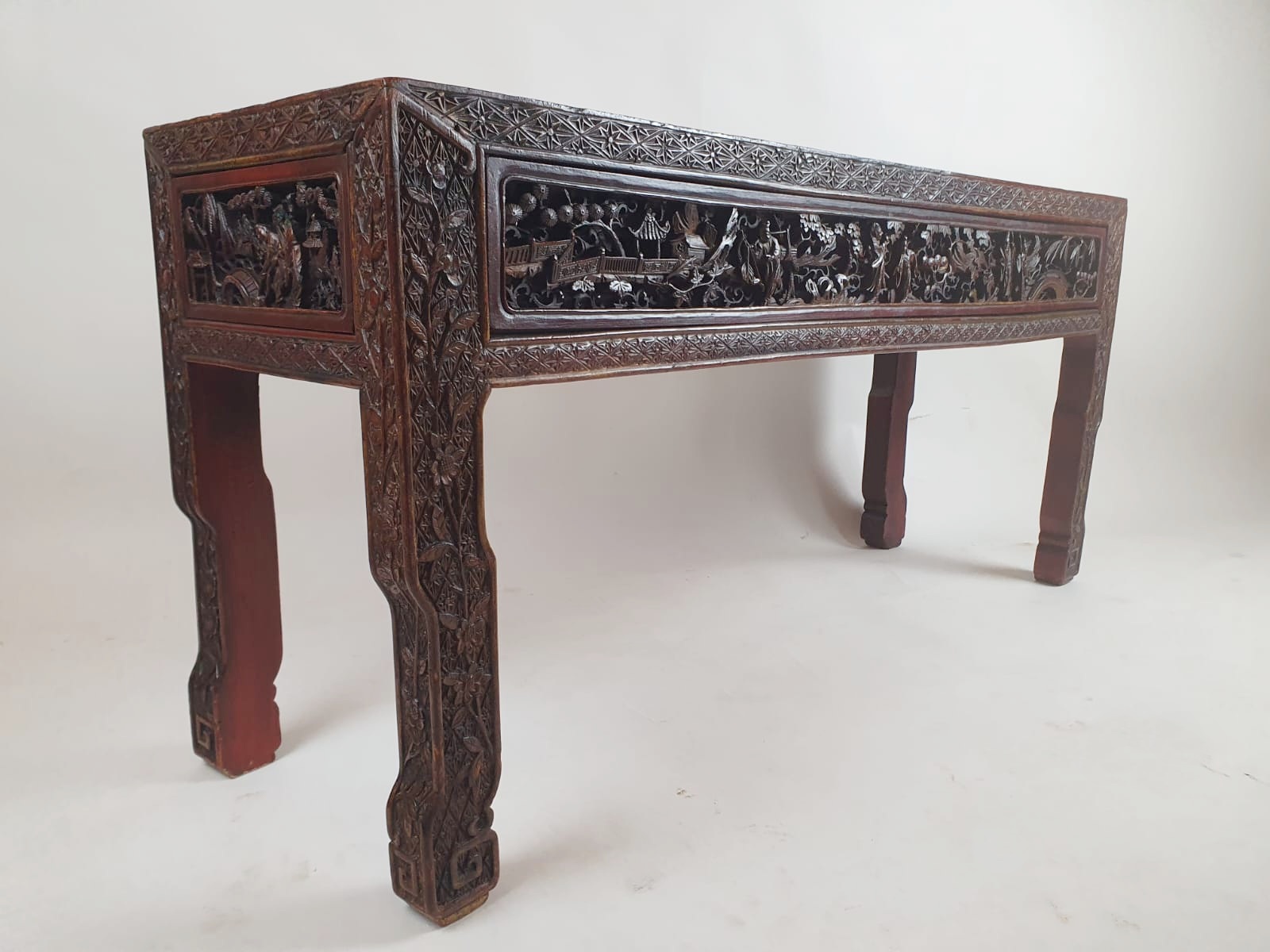 Chinese bench, red lacquered, finely carved with figures, early 20th century