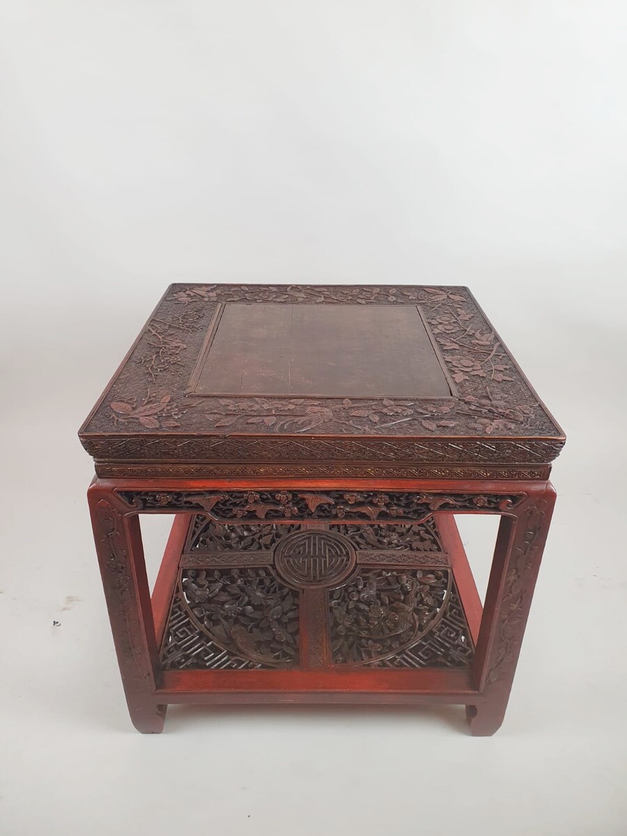 Chinese coffee table in red lacquered wood decorated with branches, flowers and birds, early 20th century