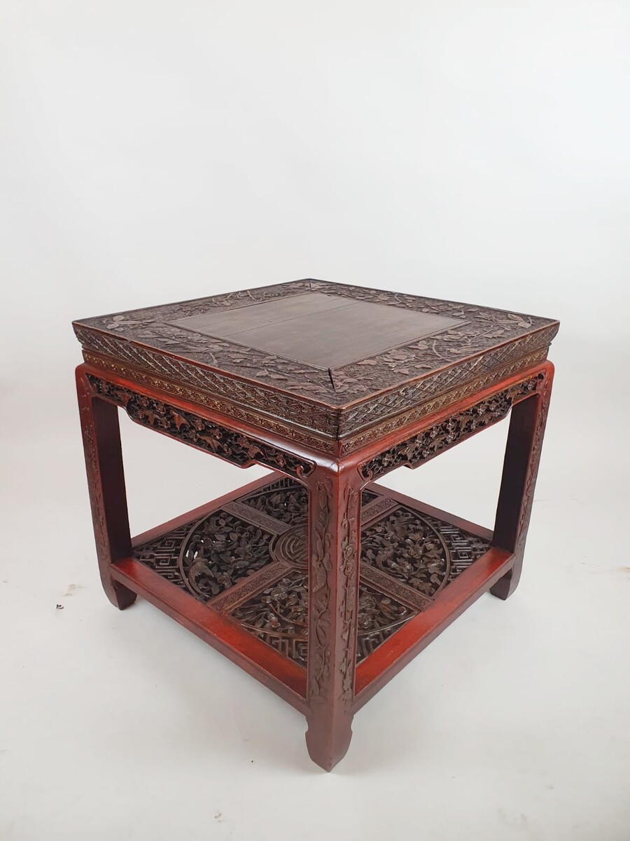 Chinese coffee table in red lacquered wood decorated with branches, flowers and birds, early 20th century