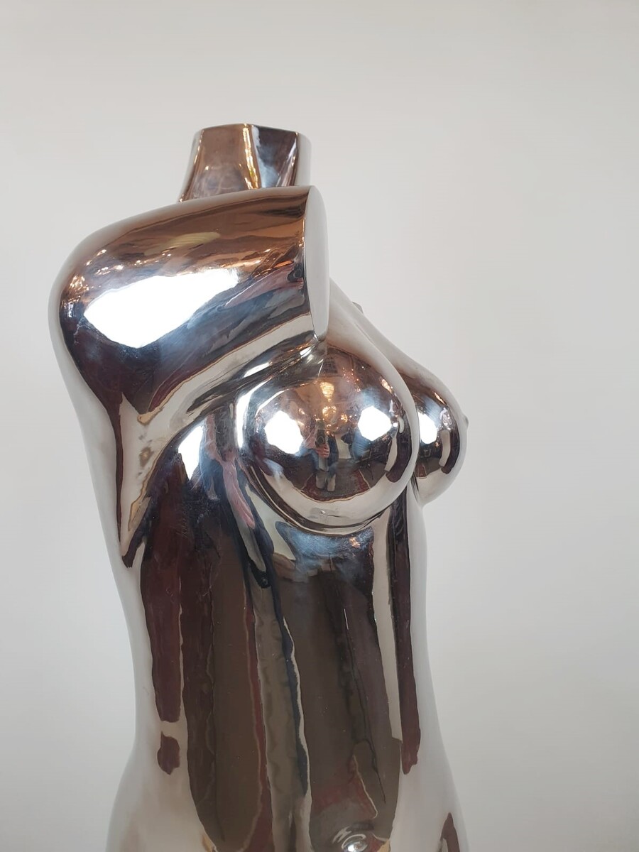 Chromed metal sculpture - signed on base Romana 2/2