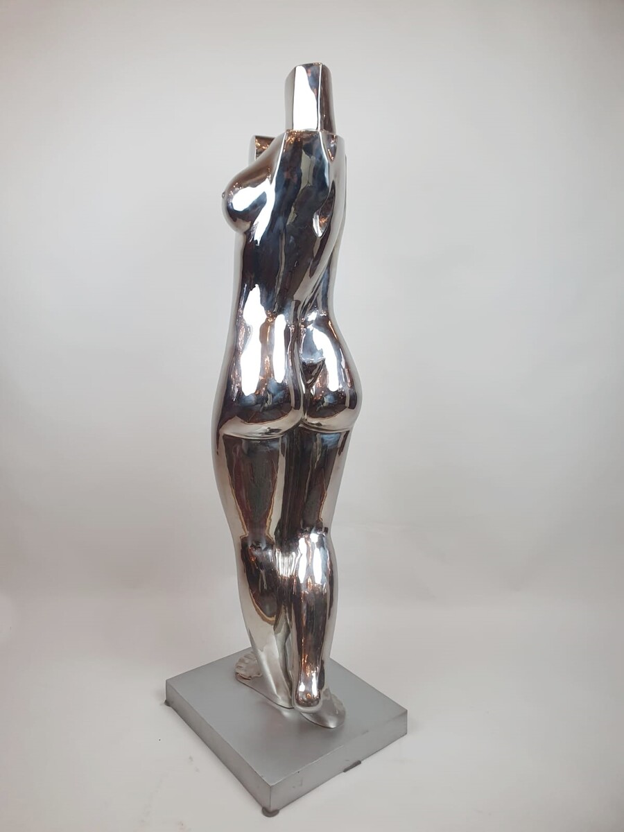 Chromed metal sculpture - signed on base Romana 2/2