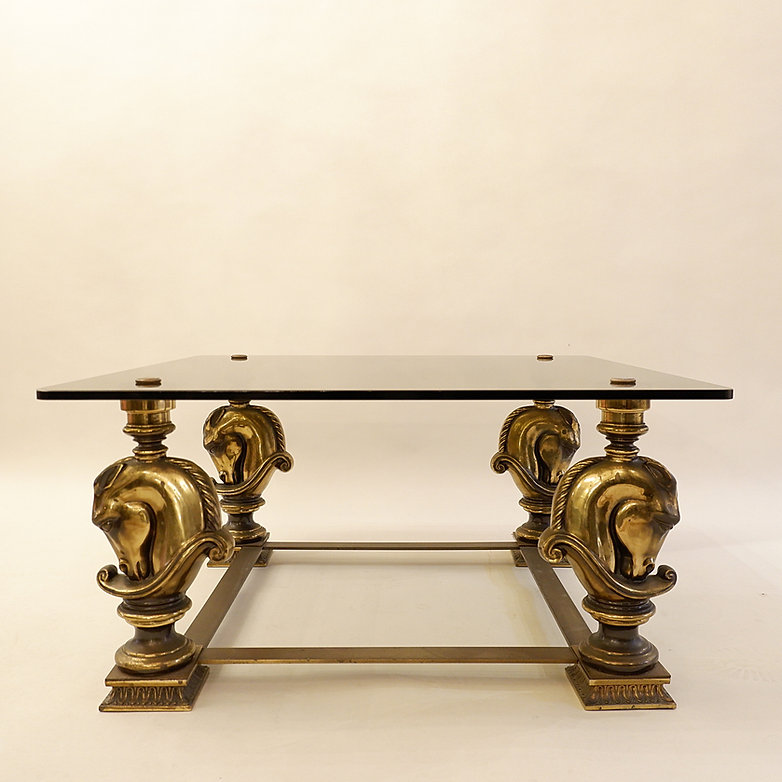 Coffee table with horses from Maison Charles. 