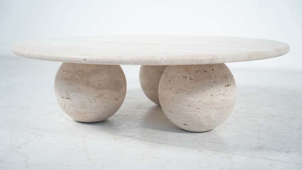 Contemporary round coffee table made of travertine, Italy