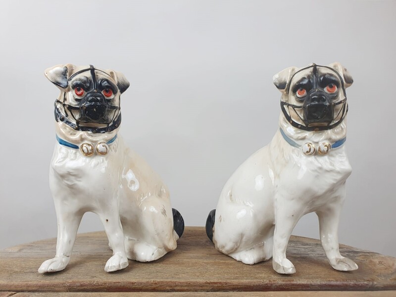 Couple of Pugs in polychrome porcelain, England late 19th