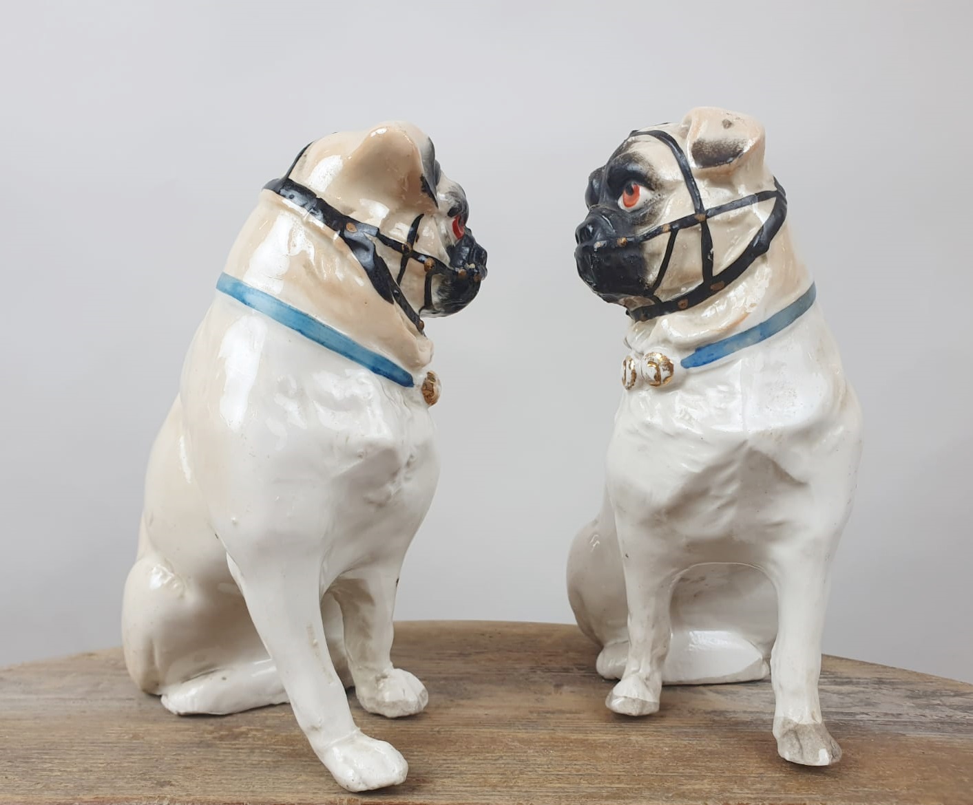 Couple of Pugs in polychrome porcelain, England late 19th