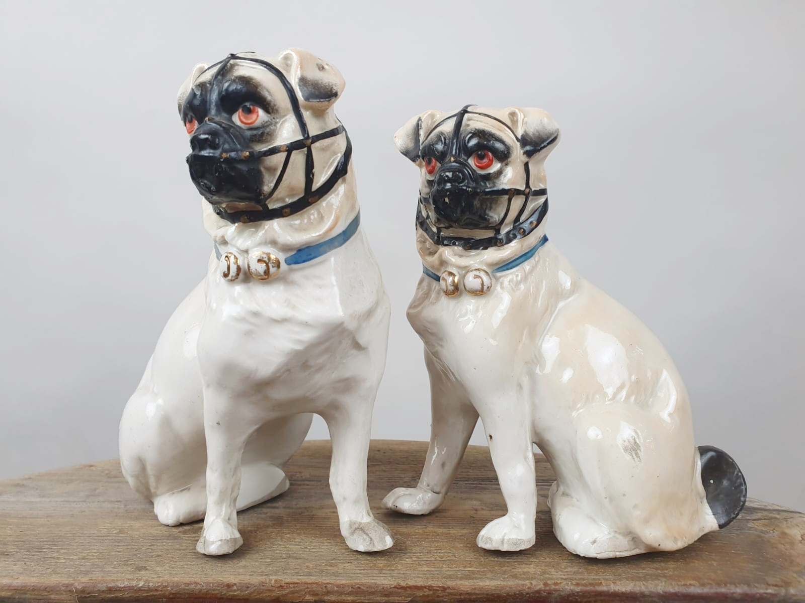 Couple of Pugs in polychrome porcelain, England late 19th