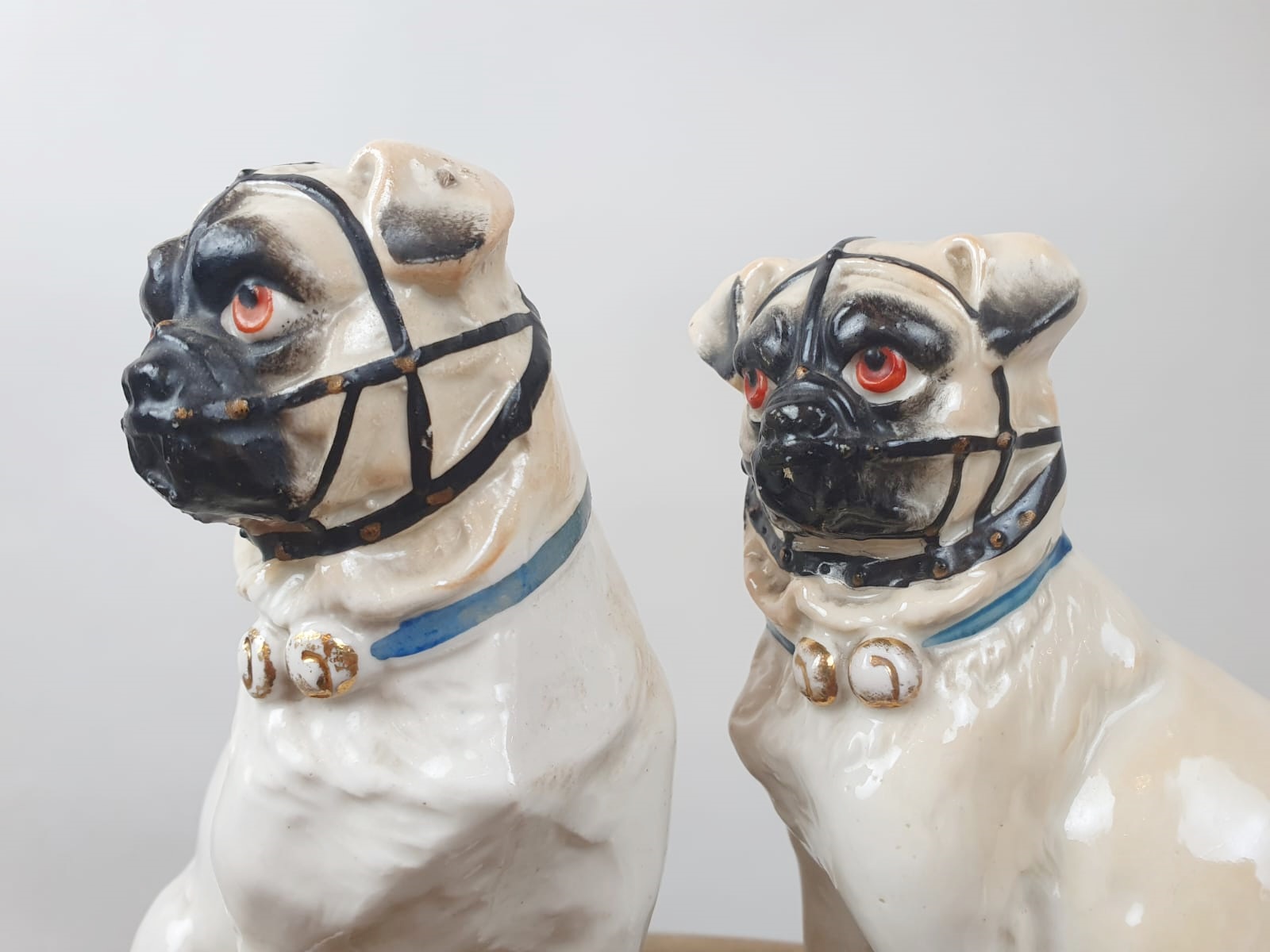 Couple of Pugs in polychrome porcelain, England late 19th