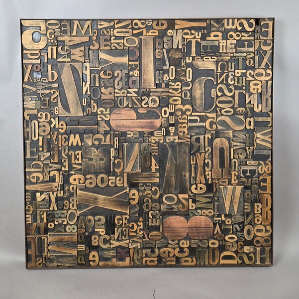 Decorative panel adorned with antique printing letters. 2 pieces available.