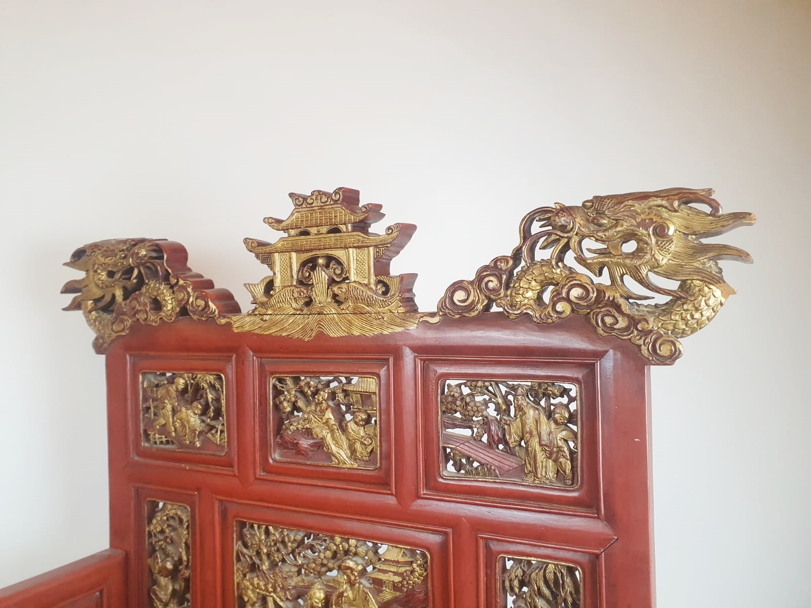 Dignitary's armchair in finely carved wood, lacquered in red and gold, early 20th century