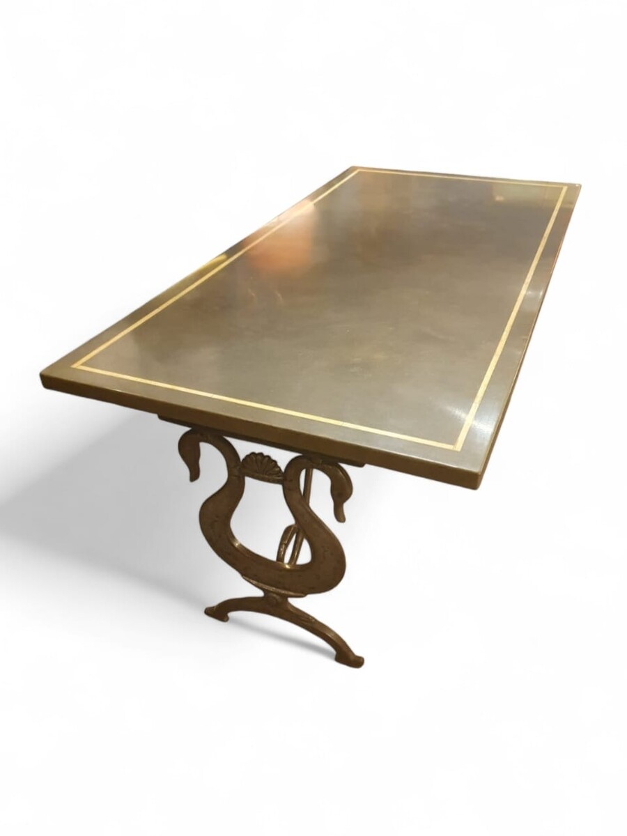 Dining room table in the style of Maison Jansen, lacquered top, cast iron and wrought iron base, circa 1970