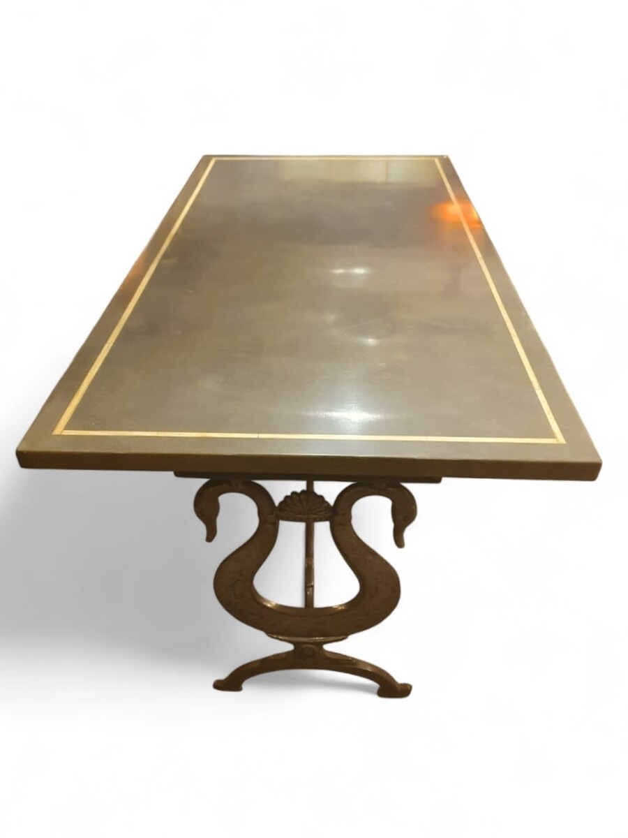 Dining room table in the style of Maison Jansen, lacquered top, cast iron and wrought iron base, circa 1970