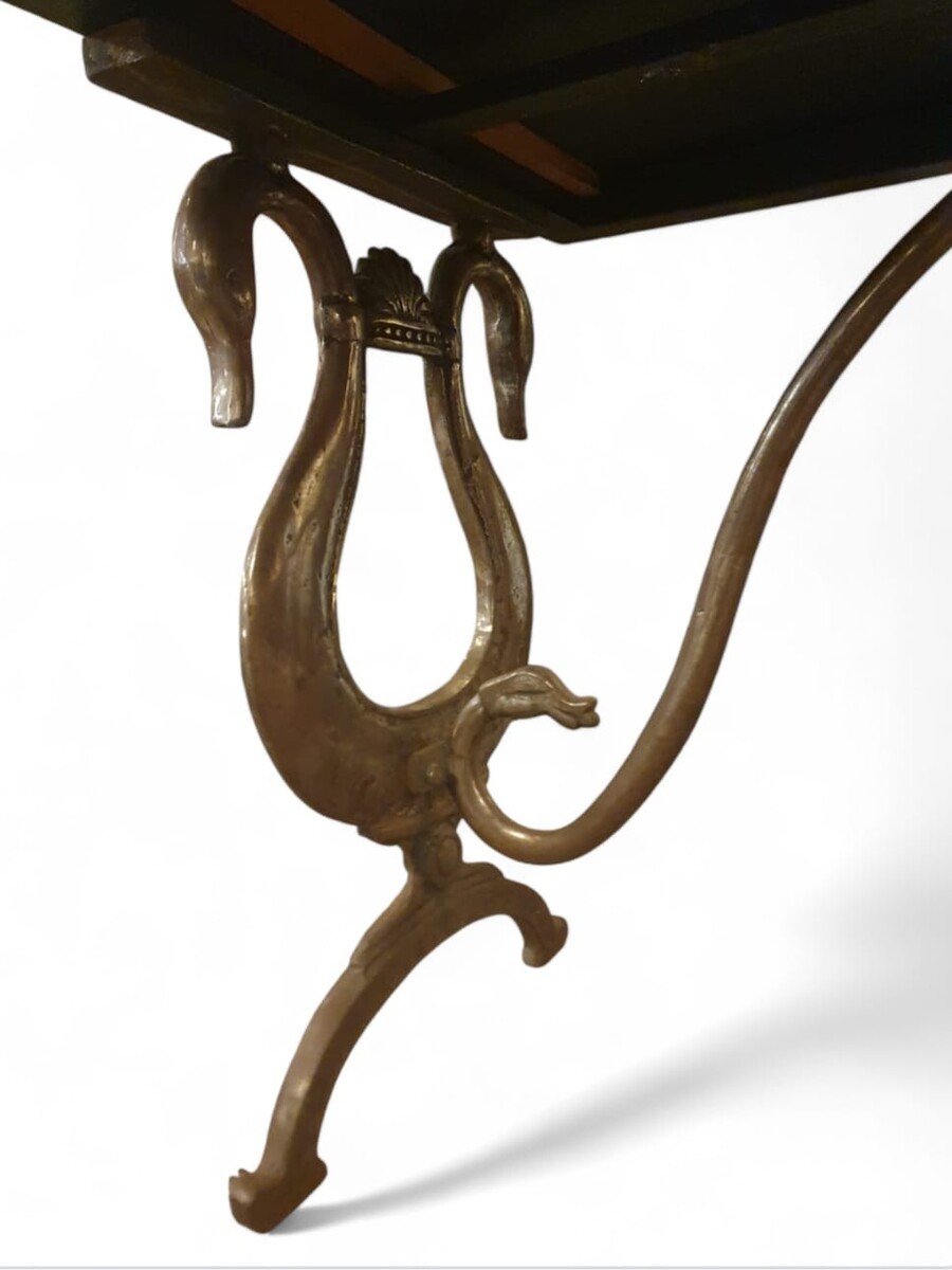 Dining room table in the style of Maison Jansen, lacquered top, cast iron and wrought iron base, circa 1970