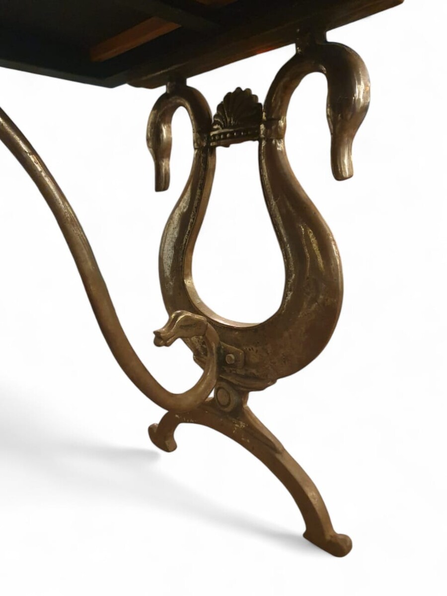 Dining room table in the style of Maison Jansen, lacquered top, cast iron and wrought iron base, circa 1970