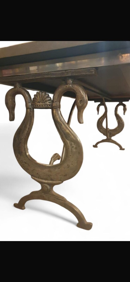 Dining room table in the style of Maison Jansen, lacquered top, cast iron and wrought iron base, circa 1970