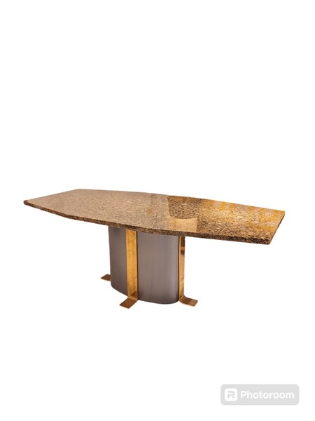 Dining table with steel and bronze legs and granite top