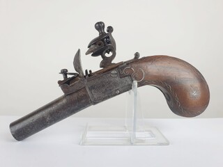 Flintlock pistol with silver wire on the stock, retractable trigger, France, circa 1800