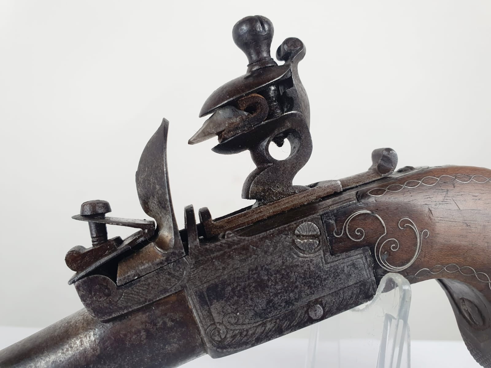 Flintlock pistol with silver wire on the stock, retractable trigger, France, circa 1800