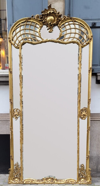 Large gilded stucco mirror