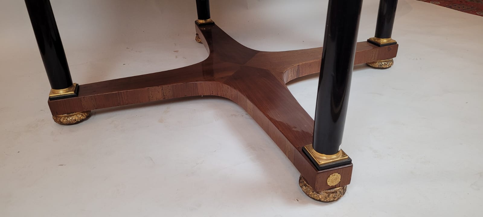 large round table with column legs from the empire period - fruitwood marquetry and gilded bronze