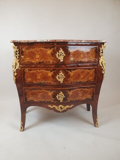 Louis XV style chest of drawers inlaid with rosewood and fruitwood