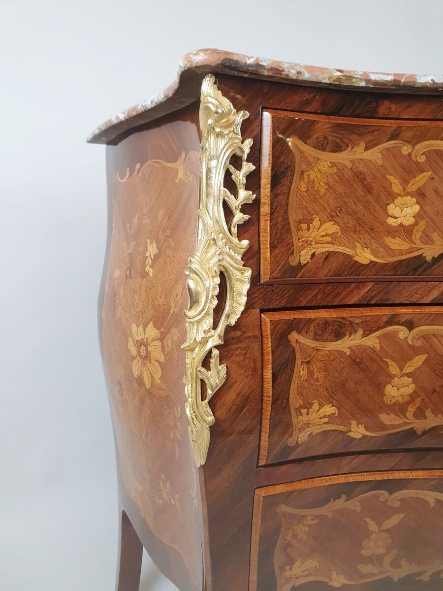 Louis XV style chest of drawers inlaid with rosewood and fruitwood