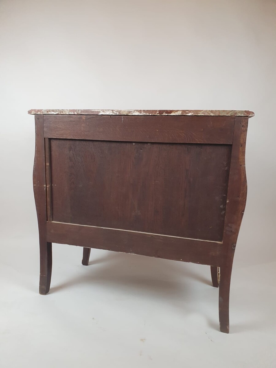 Louis XV style chest of drawers inlaid with rosewood and fruitwood