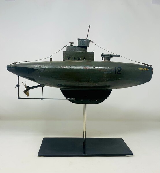 Model submarine mounted on a base 