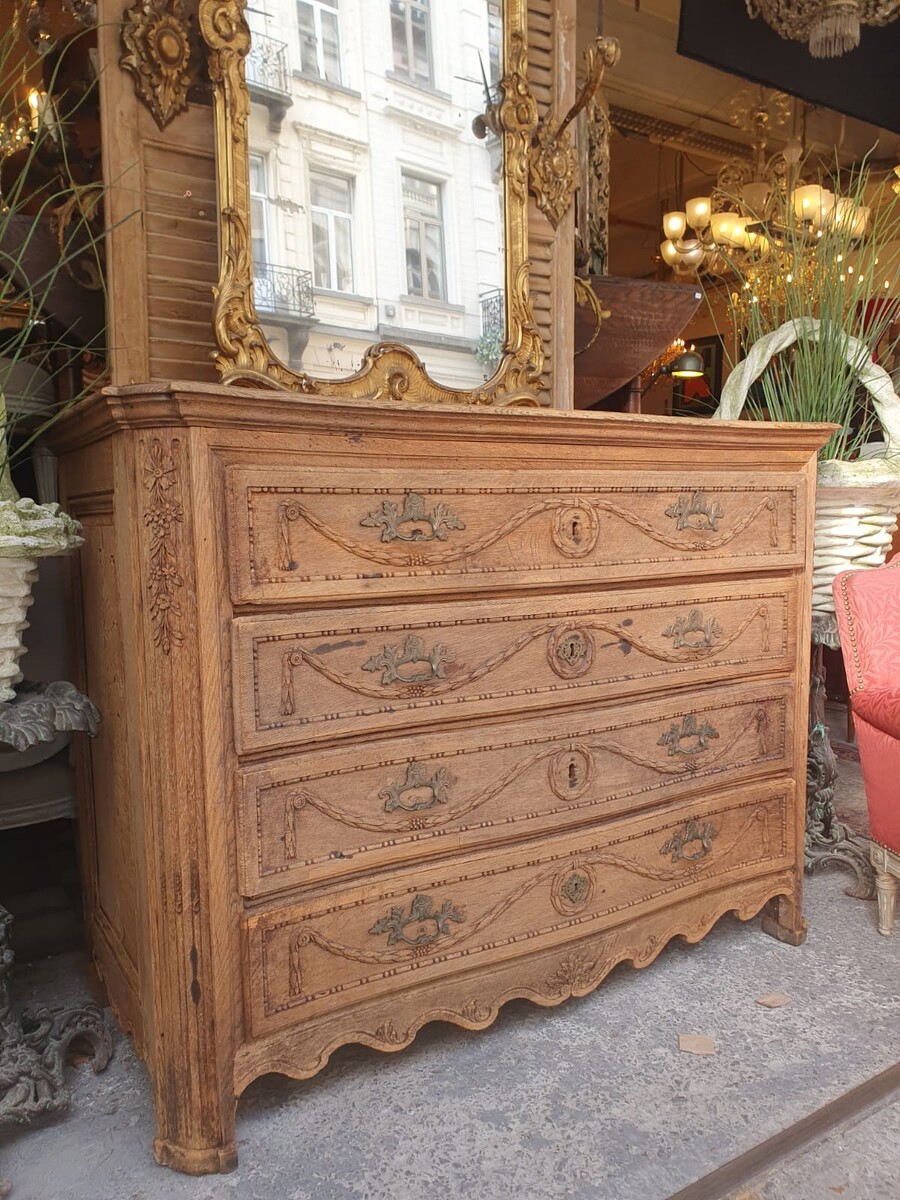 Oak chest of drawers opening with 4 rows of drawers, early 19th century