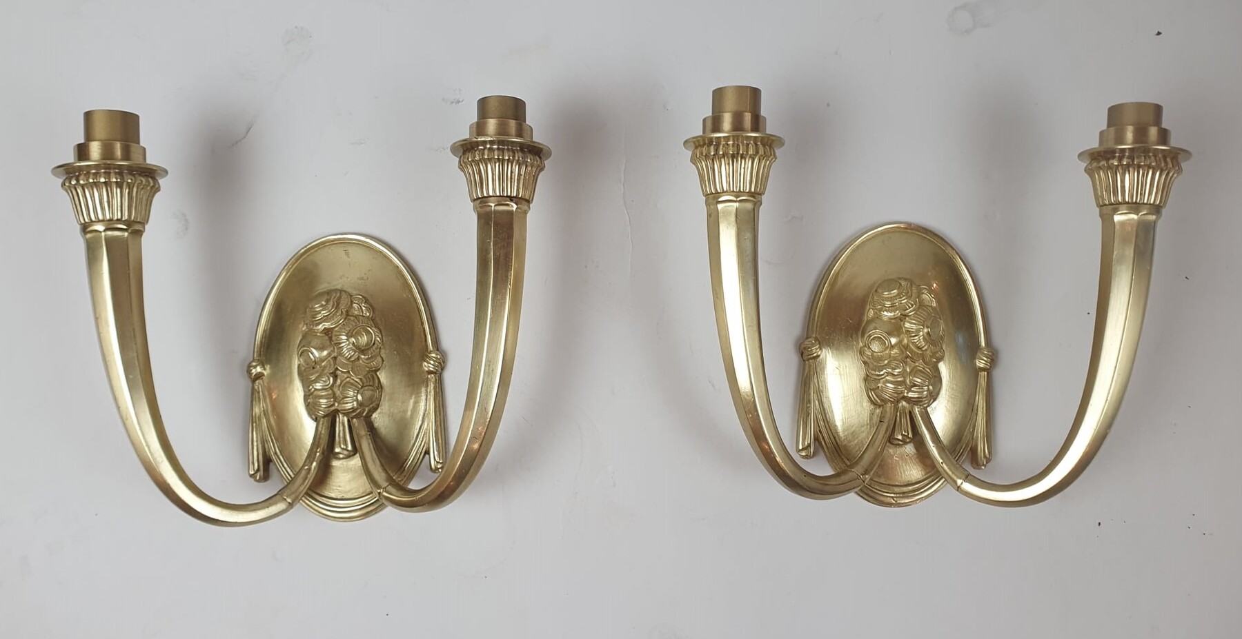 Pair of Art Deco wall lights in gilded bronze