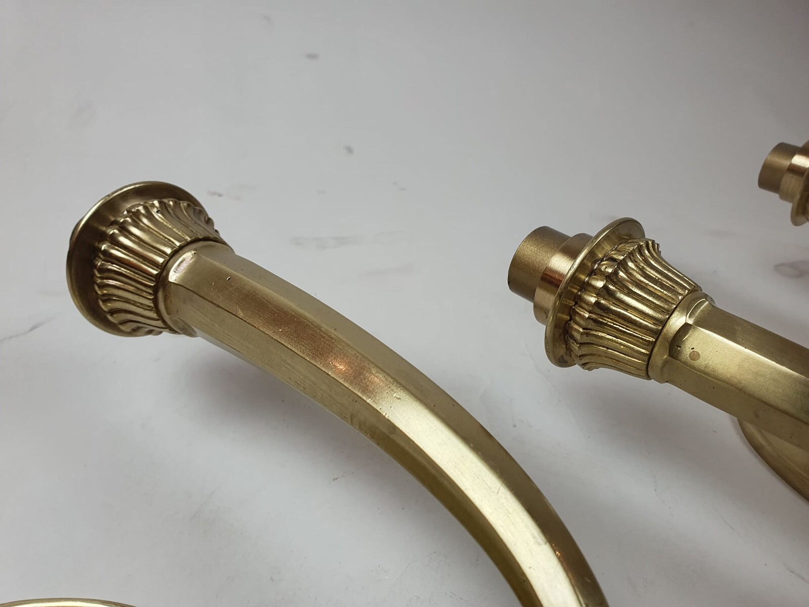 Pair of Art Deco wall lights in gilded bronze