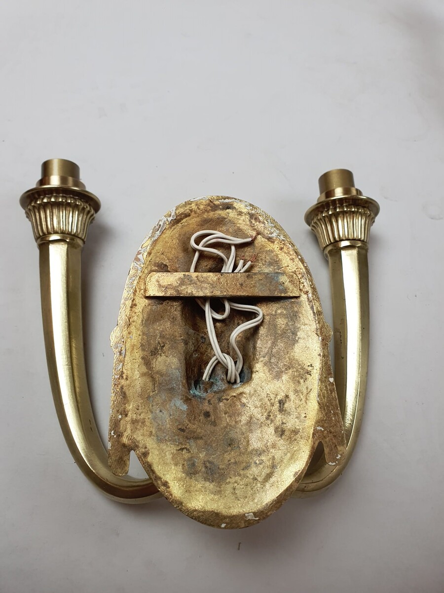 Pair of Art Deco wall lights in gilded bronze