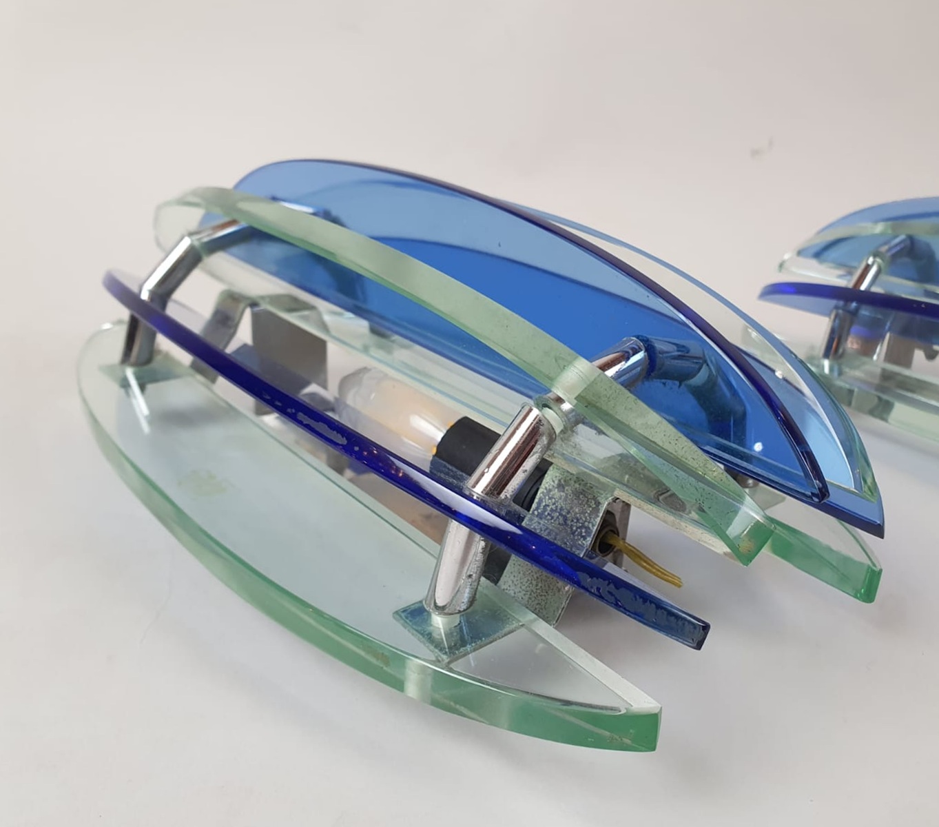 Pair of blue and transparent glass wall lights. VECA brand - Italy circa 1960.