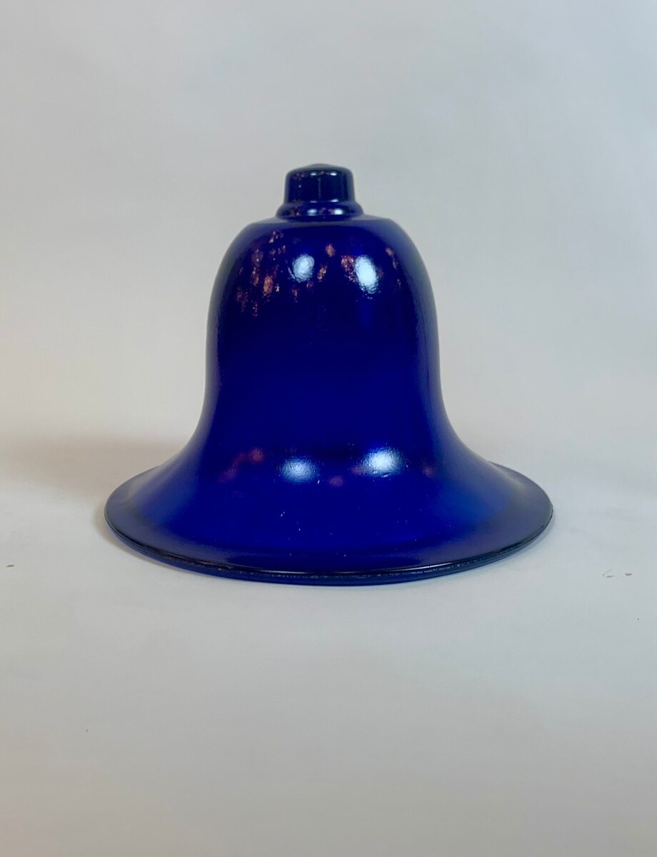 pair of blue glass basins on wrought iron arrow bases