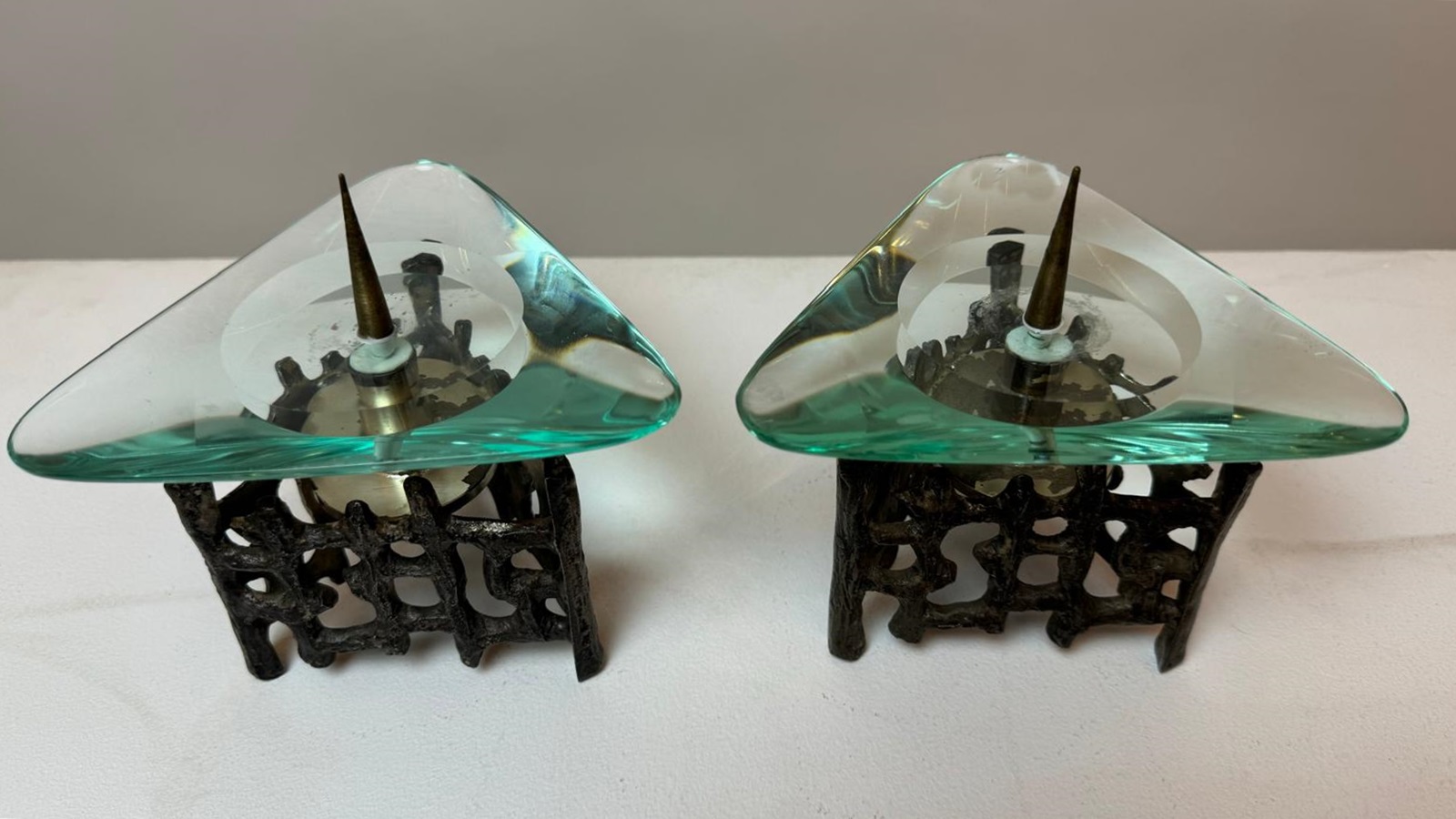 Pair of bronze and glass candlesticks in the style of Fontana Arte