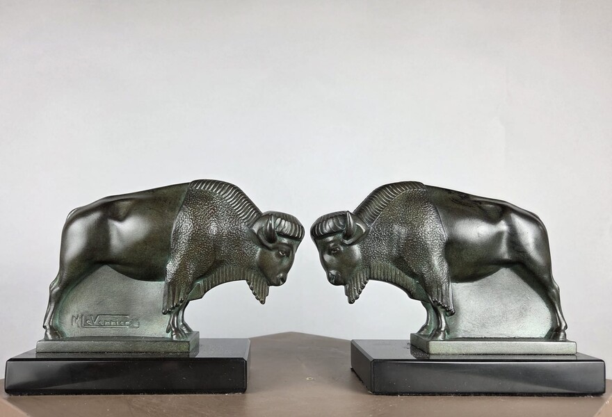 Pair of bronze bookends signed by Max Leverrier